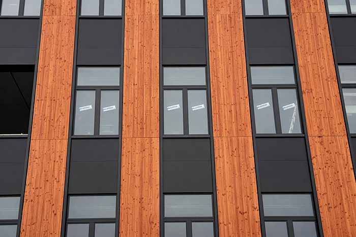Surface modified wooden facade.